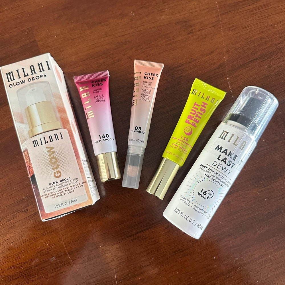 Dewy facial Milani makeup products.